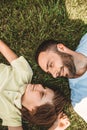 Glad boy and optimistic man during rest Royalty Free Stock Photo