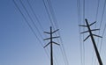 The side of the power lines in the blue sky Royalty Free Stock Photo