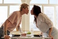 Lesbian couple having fun during romantic dinner