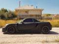 Side view of a luxury black sport car