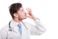 Side view of male medic kissing his fingers