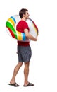 Side view of man with a beach bag that goes to side Royalty Free Stock Photo