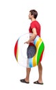 Side view of man with a beach bag that goes to the side Royalty Free Stock Photo