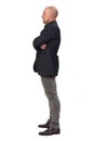 Side view of a man with blazer on white background, arms crossed Royalty Free Stock Photo