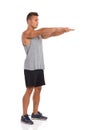 Side View Of Man With Outstretched Arms