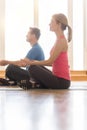 Side View Of Mature Couple Meditating At Home