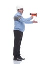 Side view. a Mature man with a megaphone explains something. Royalty Free Stock Photo