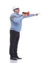 Side view. a Mature man with a megaphone explains something. Royalty Free Stock Photo