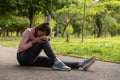 Exhausted jogger woman in the park