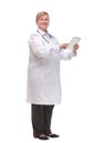 Side view of a middle age smiling doctor using a tablet computer Royalty Free Stock Photo