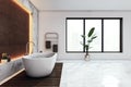 Side view of modern bright bathroom interior. Hotel interiors concept Royalty Free Stock Photo