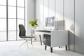 Side view on modern home office table with computer, chair, light interior and big window