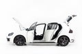 side view of new white car with open doors and open hood Royalty Free Stock Photo