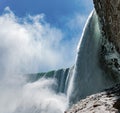 Niagara Falls Winter Side View mist and blue sky Royalty Free Stock Photo