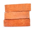 Side view of old red or orange bricks in stack isolated on white background with clipping path Royalty Free Stock Photo