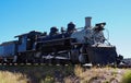 An Old Locomotive Sits in the Desert