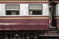 Side view of old vintage bogie and doorway of diesel electric locomotive train on railroad track, Take picture from platform Royalty Free Stock Photo