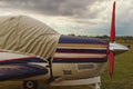 Side view of one engine airplane on a cloudy day. A small private airfield in Zhytomyr, Ukraine Royalty Free Stock Photo