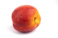 Side view on one isolated orange fruit nectarine on white background Royalty Free Stock Photo