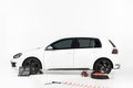 side view of one new white car with tools Royalty Free Stock Photo