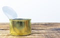 Side view of open jar isolated on wooden background.copyspace for text