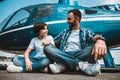 Pleased child telling with happy father outdoor Royalty Free Stock Photo