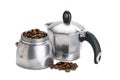 Side view parts of italian moka pot coffee maker with roasted arabica coffee beans Royalty Free Stock Photo