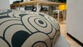 Side view patterned round seat cushion.