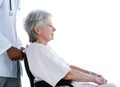 Side view of pensive senior patient in wheelchair