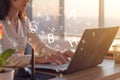 Side view photo of a female using laptop, working, typing, surfing the internet at workplace Royalty Free Stock Photo