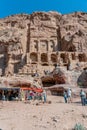 Side view photograph of the Tourist Stands at the Royal Tombs and facades at Petra, Jordan Royalty Free Stock Photo