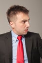 Side view picture of a young business man making Royalty Free Stock Photo