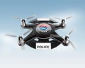 Side view of police drone on blue sky. Royalty Free Stock Photo