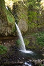 Side view of Ponytail Falls in the Columbia River Gorge waterfall area of Oregon