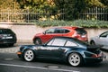 Side View Of Porsche 964 Turbo Of Midnight Blue Metallic Car In Motion