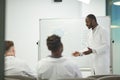 African American Man Presenting at Medical Seminar Side View Royalty Free Stock Photo