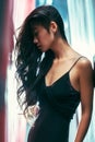 Side view portrait of asian beautiful woman posing, head tilted, look down