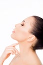 Side view portrait of beautiful sensitive woman touching her neck Royalty Free Stock Photo