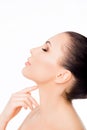 Side view portrait of beautiful sensitive woman touching her nec Royalty Free Stock Photo