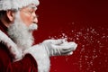 Santa Claus Blowing Snow on Red Royalty Free Stock Photo