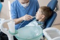 Dentist Treating Little Kid