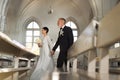 Senior Couple Walking Together Down Church Aisle on Wedding Day Royalty Free Stock Photo