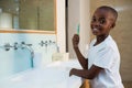 Side view of portrait of smiling boy with toothbrush Royalty Free Stock Photo