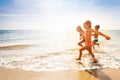 Cute kids having fun on sandy beach in summer Royalty Free Stock Photo