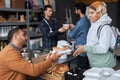 Middle Eastern Woman Receiving Food at Refugee Help Center Royalty Free Stock Photo