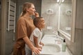 Baby Boy Brushing Teeth with Mom Royalty Free Stock Photo