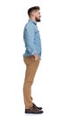 Side view of a positive casual man standing