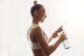 Happy slim woman with bottle of water Royalty Free Stock Photo