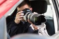 Private Detective Photographing With Slr Camera Royalty Free Stock Photo
