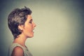 Side view profile woman talking with sound coming out of her open mouth Royalty Free Stock Photo